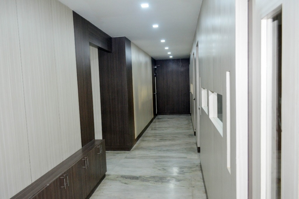 Premium interior hallway with marble flooring at Fly Air Aviation Academy Chennai