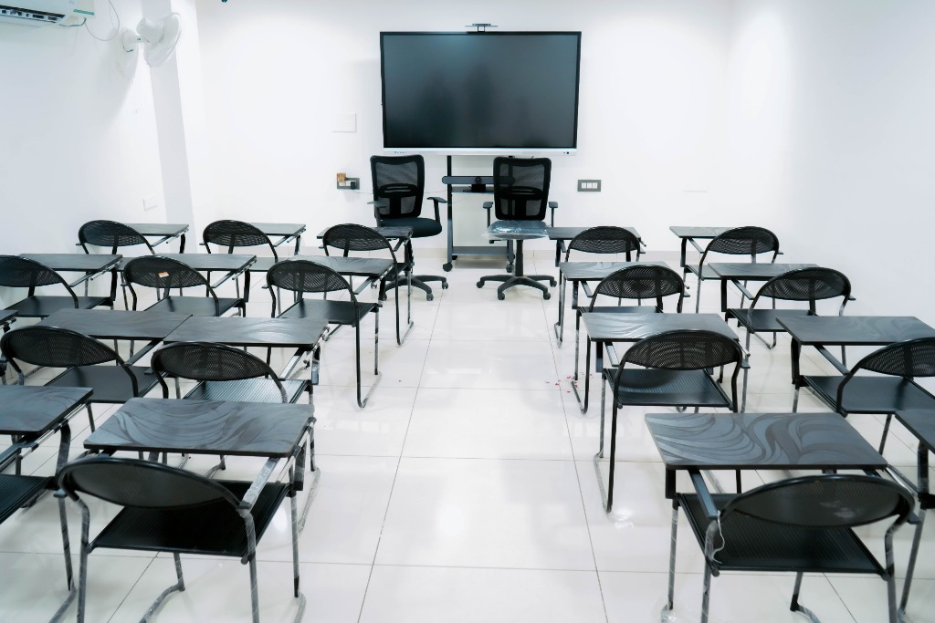 A modern clean AV-equipped lecture hall at Fly Air Aviation Academy campus